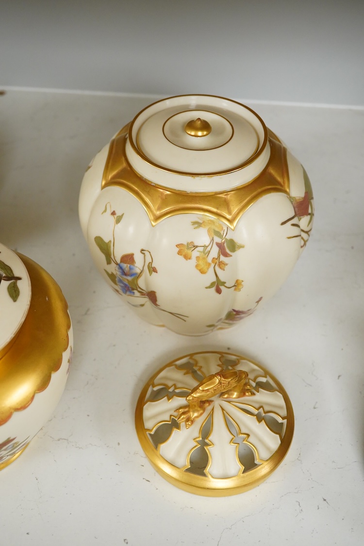 Three 19th century Worcester blush ivory potpourri or biscuit jars and covers, two with liners, each decorated with flowers and buds, largest 20cm high